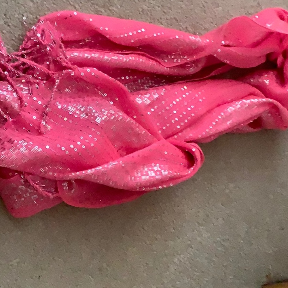 I am selling a pink sparkly scarf